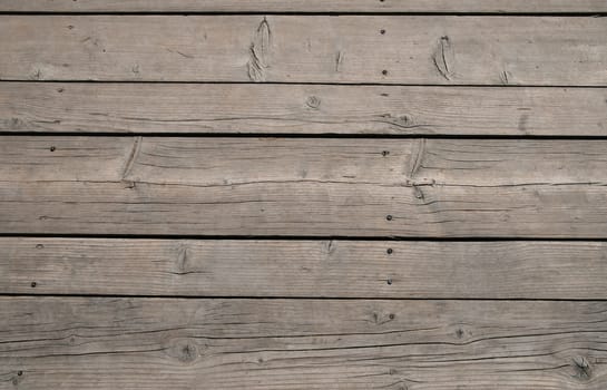 Old vintage rustic aged antique wooden sepia panel with horizontal gaps, planks and chinks