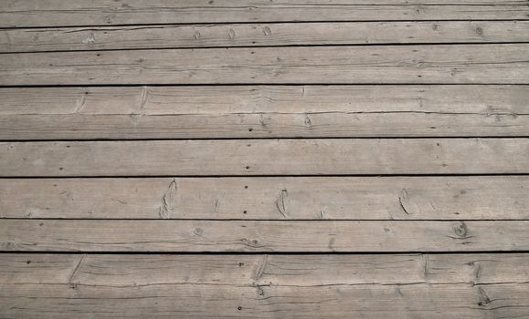 Old vintage rustic aged antique wooden sepia panel with horizontal gaps, planks and chinks