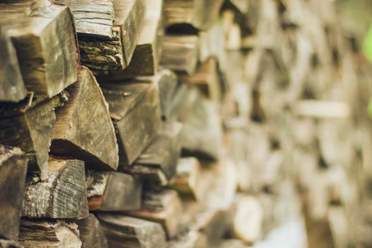 A stack of firewood close up with a large depth of field