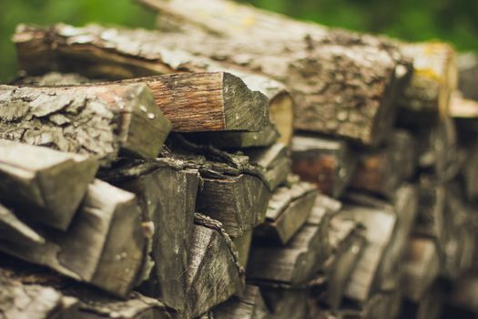 A stack of firewood close up with a large depth of field