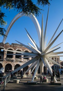 VERONA, ITALY - CIRCA DECEMBER 2014: The City installs for Christmas in the central square a huge white comet circa december 2014. An act appreciated by locals and tourists.