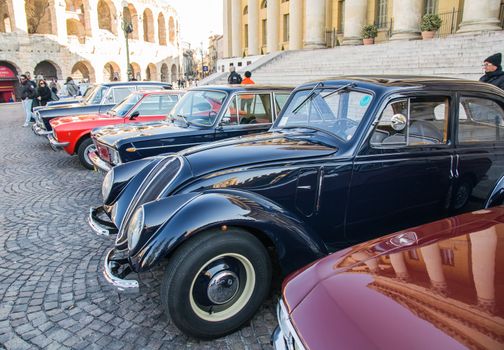 VERONA, ITALY - JANUARY 6: Classic vintage cars. Benaco Classic Autoclub organizes a gathering called "witch of the policeman" on Verona Tuesday, January 6, 2015. The proceeds are donated to charity.