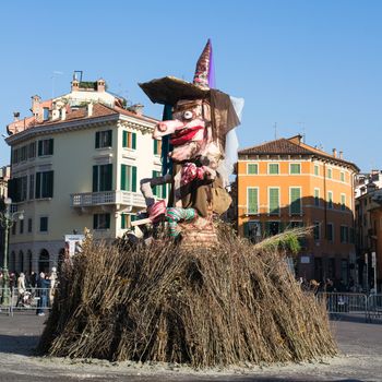 VERONA, ITALY - JANUARY 6: witch at the stake. Traditional annual bonfire in the square called Bra Sunday, January 6, 2015.
