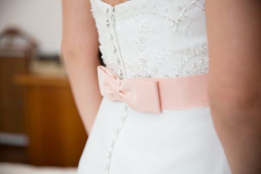 wedding dress pink bow detail