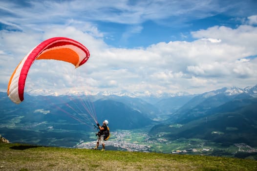 paraglider starts from the mountain