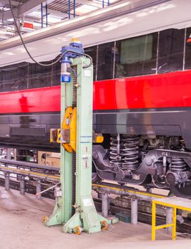 lifting a railway wagon for maintenance in a workshop major repairs