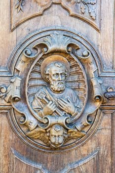 carved wooden portal of an italian church