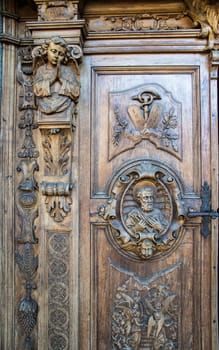 carved wooden portal of an italian church