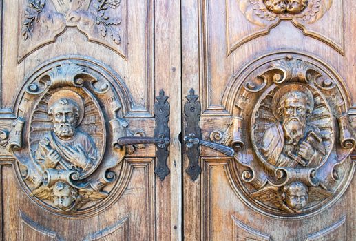 carved wooden portal of an italian church