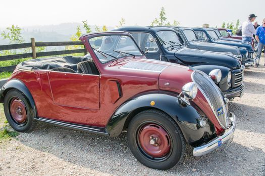 VERONA, ITALY - SEPTEMBER 27: Topolino cars. Topolino Autoclub Italia organizes a gathering on Lake Garda Sunday, September 27, 2014. Cars and enthusiasts from all over Italy.