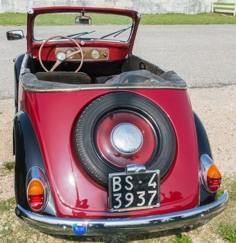 VERONA, ITALY - SEPTEMBER 27: Topolino car. Topolino Autoclub Italia organizes a gathering on Lake Garda Sunday, September 27, 2014. Cars and enthusiasts from all over Italy.