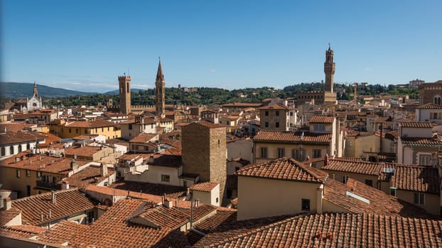 In the picture an aerial view of the old town of Florence