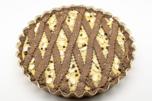 freshly baked cocoa tart with ricotta cheese and chocolate