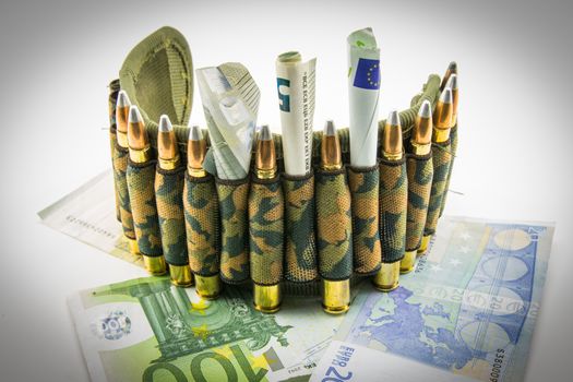 composition with bullets and banknotes