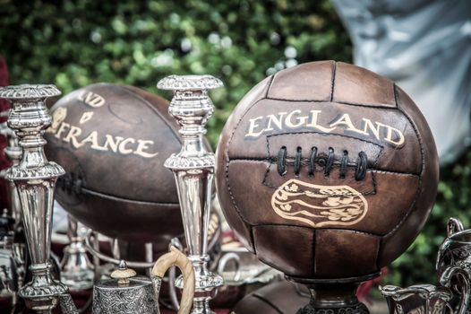 old brown soccer rugby balls