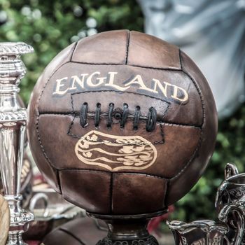 old brown soccer rugby balls