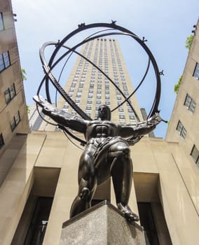 NEW YORK - JUNE 18: Atlas Statue at Rockefeller Center on June 18, 2014 in New York. The Atlas Statue is a bronze statue in front of Rockefeller Center in midtown Manhattan, New York City.