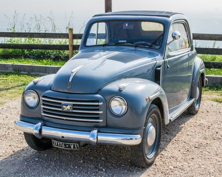 VERONA, ITALY - SEPTEMBER 27: Topolino car. Topolino Autoclub Italia organizes a gathering on Lake Garda Sunday, September 27, 2014. Cars and enthusiasts from all over Italy.