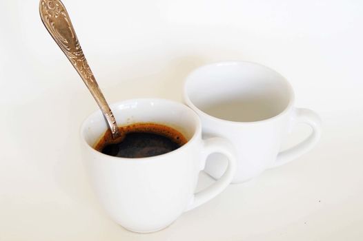 Coffee cup with a spoon, isolated