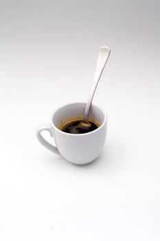 Coffee cup with a spoon, isolated
