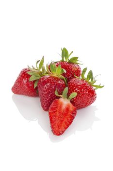 Delicious ripe strawberries isolated on white background. Healthy fruit eating.