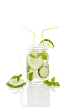 Cucumber lemonade isolated on white background. Healthy summer drink.