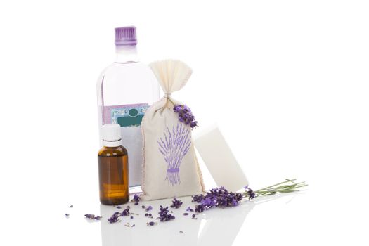 Lavender cosmetics isolated on white background. Essental oil, soap, aromatherapy and shower gel.