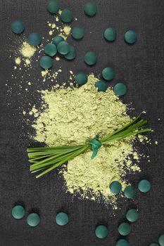 Chlorella, spirulina and wheatgrass. Green superfood, detox, healthy living, 