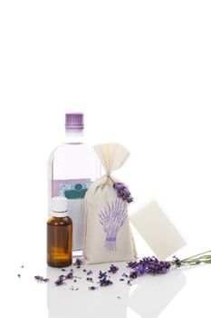 Lavender cosmetics isolated on white background. Essental oil, soap, aromatherapy and shower gel.