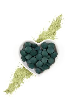 Chlorella, spirulina and wheatgrass. Green superfood, detox, healthy living, 