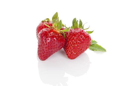 Delicious ripe strawberries isolated on white background. Healthy fruit eating.