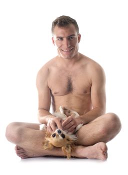 naked man and chihuahua in  front of white background