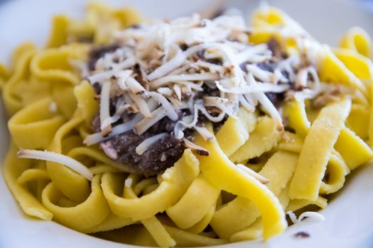 handmade tagliatelle with radicchio, mushrooms and smoked ricotta