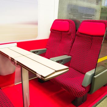 red modern seats of a railroad car