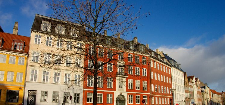 Wall of Colorful Houses with Attic Windows in Centre of Copenhagen, Denmark