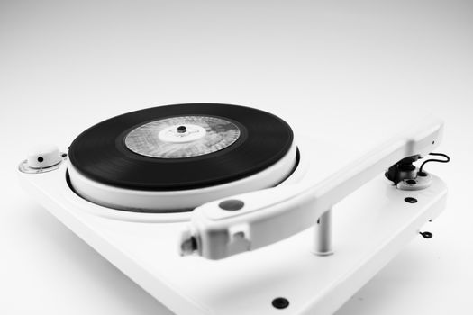 composition with vintage record player and old record