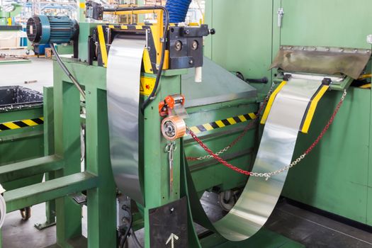 aluminum ribbon that goes to feed a press