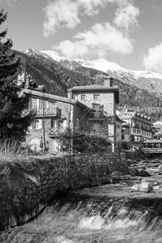Spring in a mountain creek village of Italian alps.