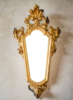 classic antique mirror with gilded frame engraved suitable as a frame or border.