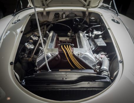 view of the engine of a classic sports car