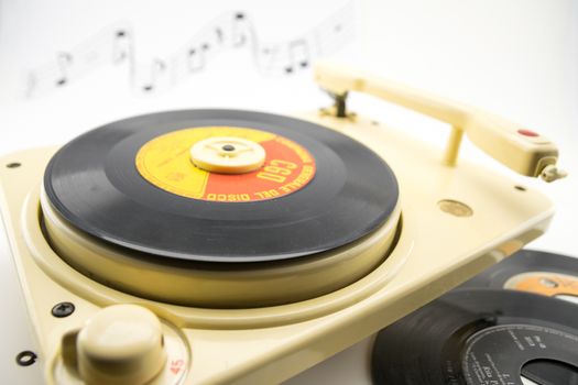 composition with vintage record player and old records