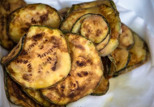 courgettes fried left to dry on paper towels