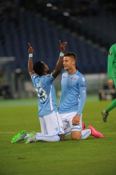 ITALY, Rome: Ogenyi Eddy Onazi (left) and Sergej Milinkovic-Savic of SS Lazio celebrate after scoring the team's first goal during a Group G match between SS Lazio and  AS Saint-Etienne in the group stage of the UEFA Europa League at Rome's Olympic Stadium on October 1, 2015. SS Lazio won the match with a score of 3-2.