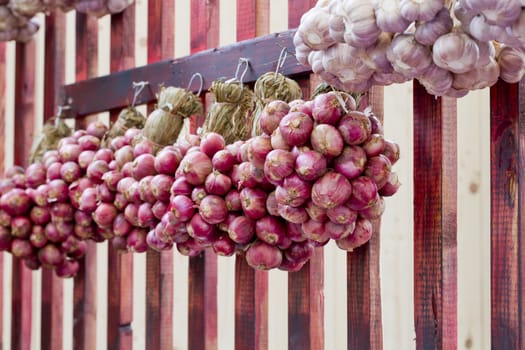 Shallots hanging in Thai Market Style