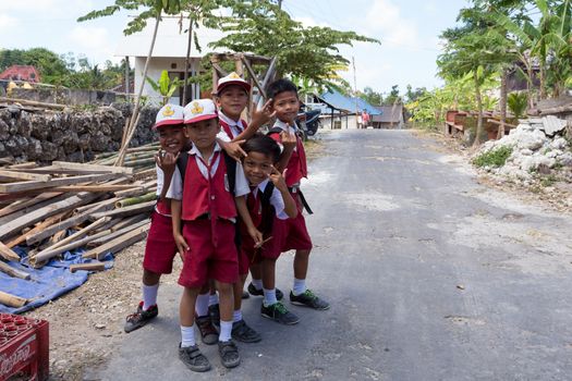 BALI, NUSA PENIDA ISLAND, INDONESIA - JULY 28.2015: Unidentified balinese hindu boys in school uniform. Nusa Penida July 27. 2015 Indonesia