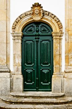 Wooden Door in the Wall of Portuguese Home