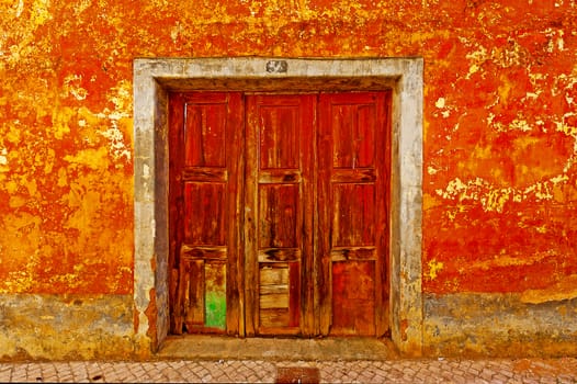 Wooden Door in the Wall of Portuguese Home