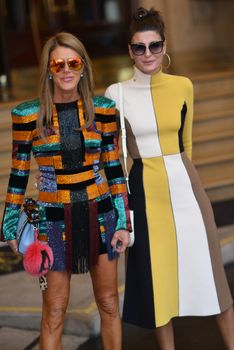 FRANCE, Paris : Italian fashionista Anna Dello Russo and her colleague enters InterContinental hotel in Paris on October 1st, 2015 for Paris Fashion week. 