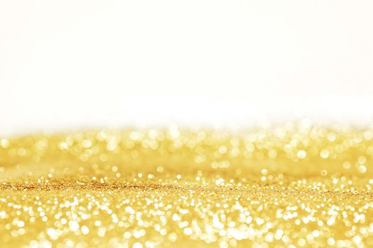 Abstract glitter bokeh holiday golden background