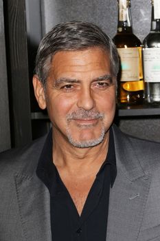 UNITED KINGDOM, London: George Clooney attends the joint launch of Clooney's new tequila label, Casamigos Tequila, and Cindy Crawford's new book Becoming at the Beaumont Hotel in central London on October 1, 2015. 
